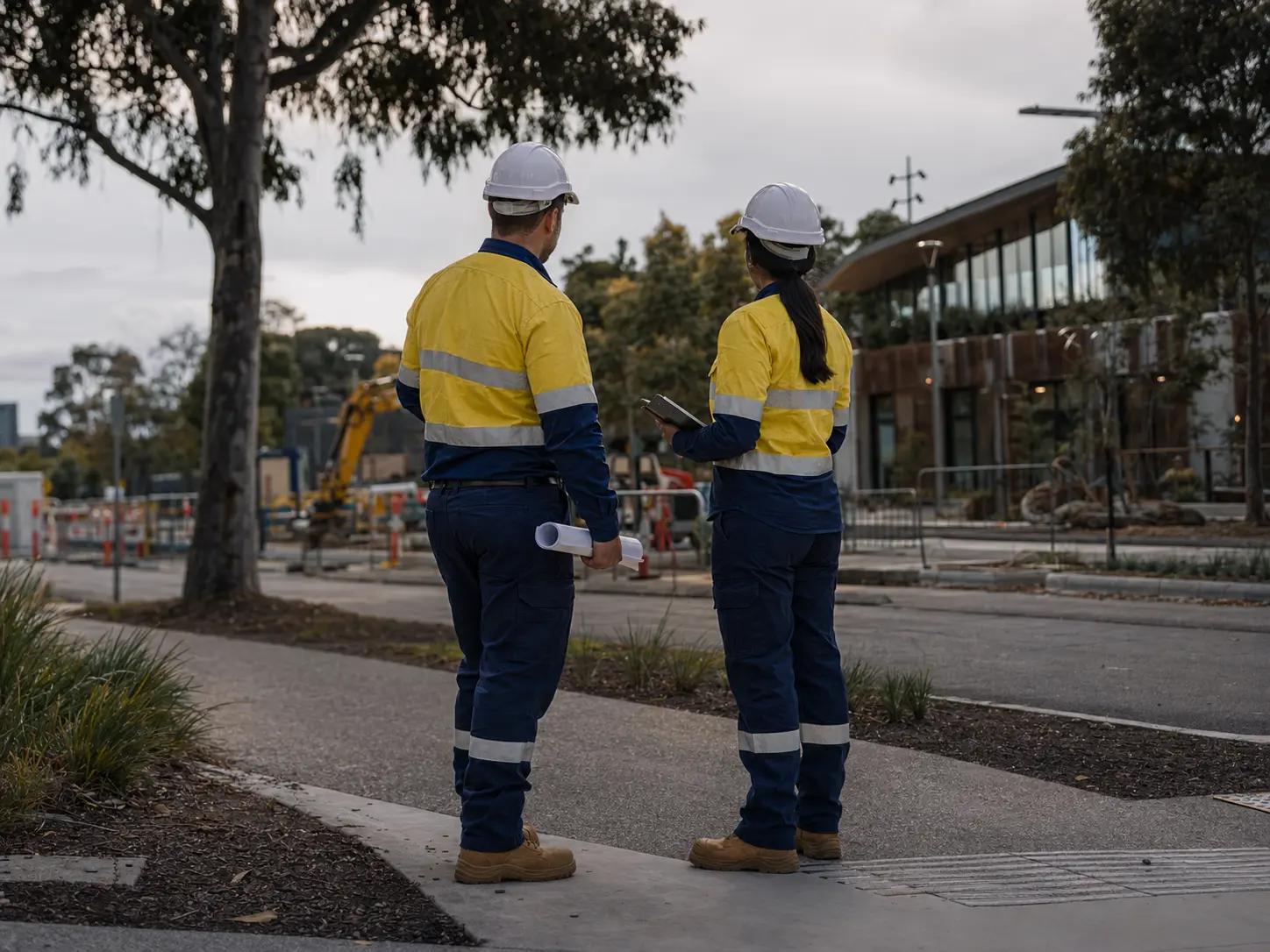 About Public works staff wearing coordinated high visibility workwear